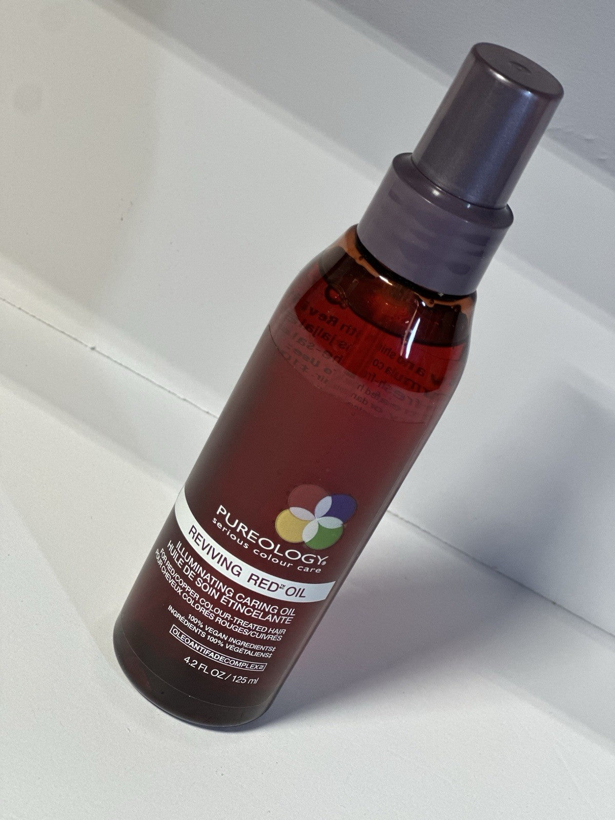 PUREOLOGY - REVIVING RED OIL  / Illuminating Caring Oil. ( 4.2 Fl.oz. )